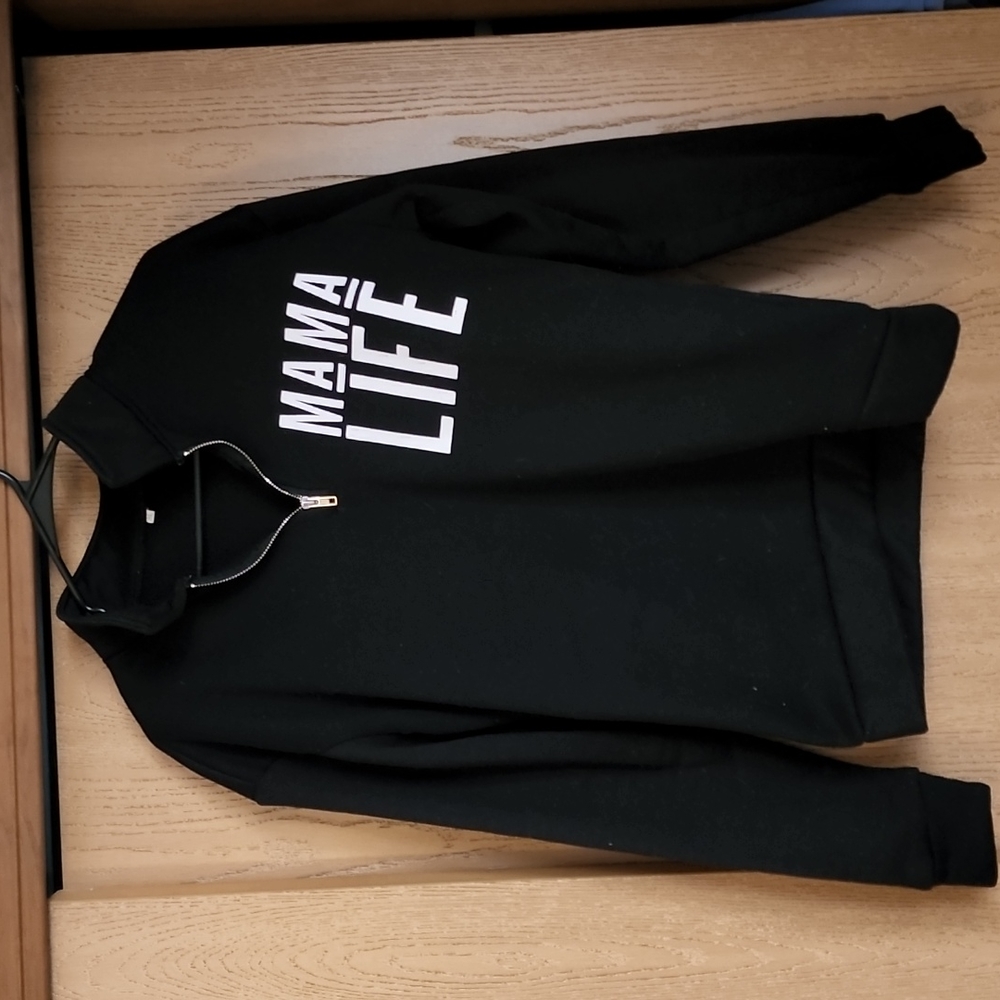 Medium black sweatshirt. Says MAMA LIFE